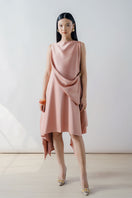 Rose pink draped sleeveless asymmetric midi dress by DOC BAN, showcasing elegant flowing fabric and stylish design.