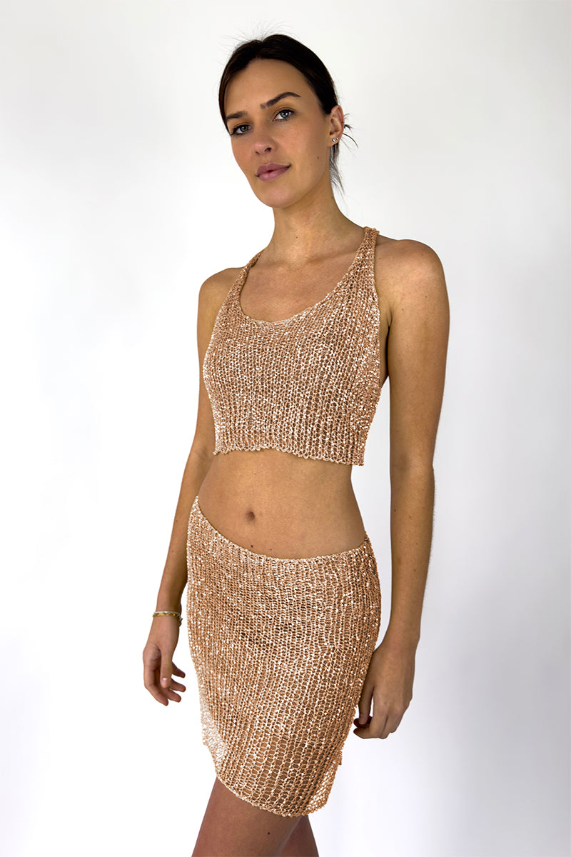Rose gold Midas racerback top with built-in bralette by Natalia Fedner, shown from the side view.