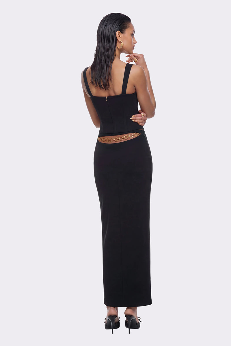 Black Nana Jacqueline Rosetta maxi skirt with ring detail, flowing fabric, and elegant design.