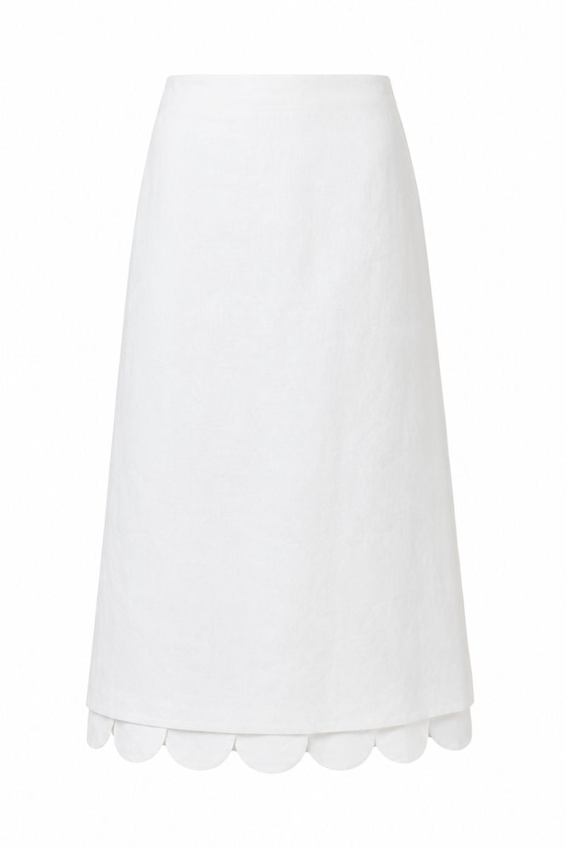 Ivory Rossette midi skirt by ANA + MARIA displayed on a ghost mannequin, showcasing its elegant flow and fabric details.