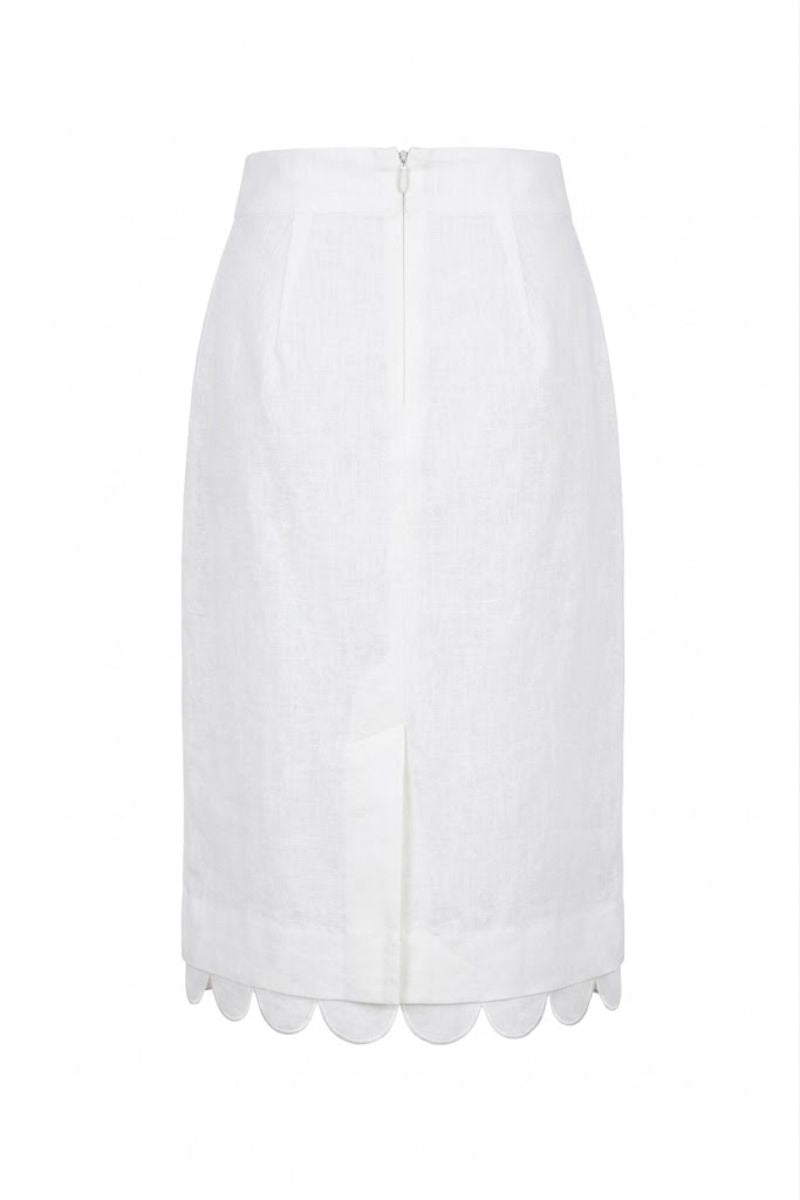 Ivory Rossette midi skirt by ANA + MARIA displayed on a ghost mannequin, showcasing its flowy fabric and elegant design.