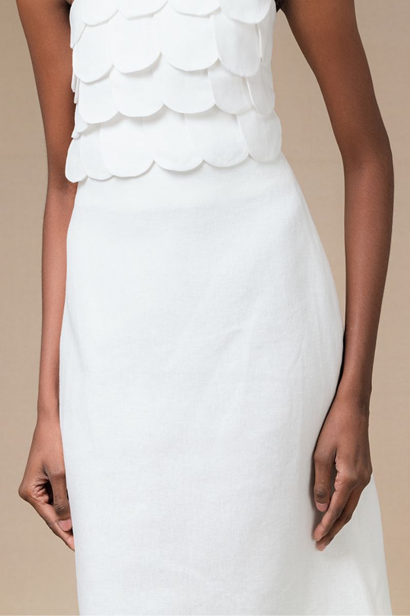 Ivory Rossette midi skirt by ANA + MARIA, featuring a flowy fabric and elegant design in the product photo.