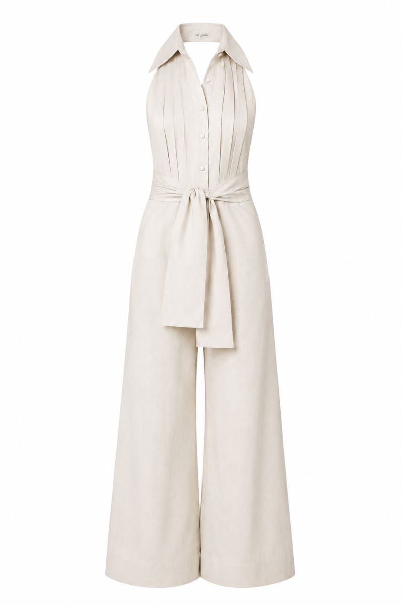 Navy blue wrapped jumpsuit by ANA + MARIA displayed on a ghost mannequin, showcasing the stylish design and fabric details.