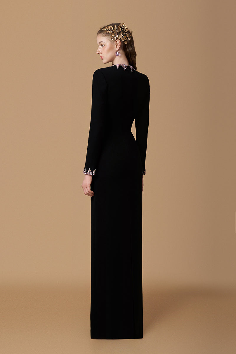 Black crepe silk-lined embellished gown with round neck and long sleeves from I.H.F, elegant and flowing column style.
