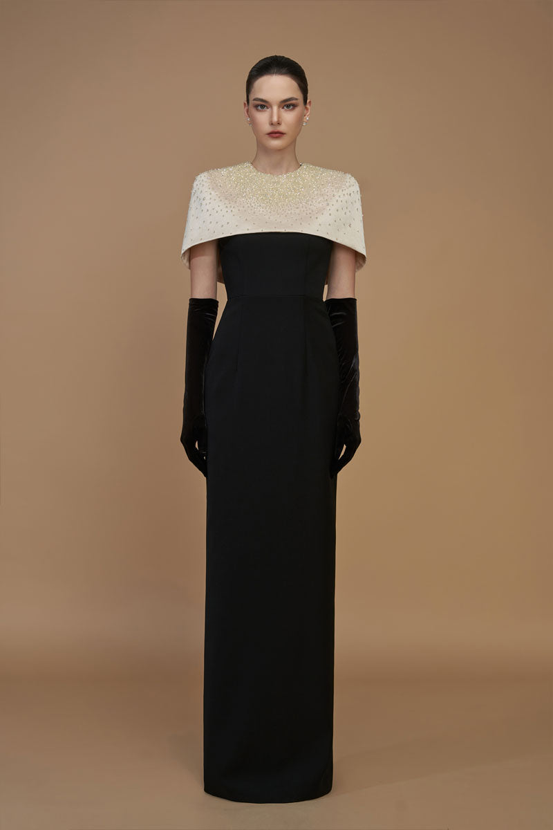White crepe and silk taffeta cap sleeve gown with mini cape, designed by I.H.F, featuring a round neck and elegant column silhouette.
