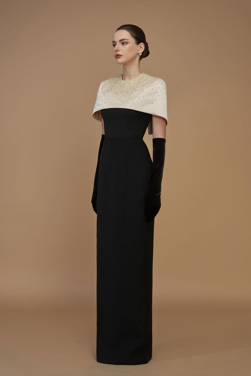 Elegant white crepe and silk taffeta cap sleeve gown with a mini cape, featuring a round neck, by I.H.F.