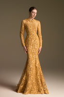 Yellow mermaid gown with round neck and long sleeves from I.H.F, featuring intricate lace details and a fitted silhouette.