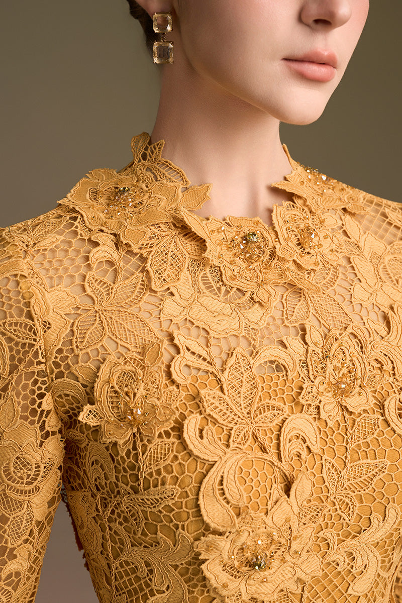 Yellow mermaid gown with round neck and long sleeves in lace, designed by I.H.F, styled with intricate guipure lace details.