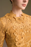 Yellow mermaid gown with round neck and long sleeves by I.H.F, featuring intricate guipure lace details.