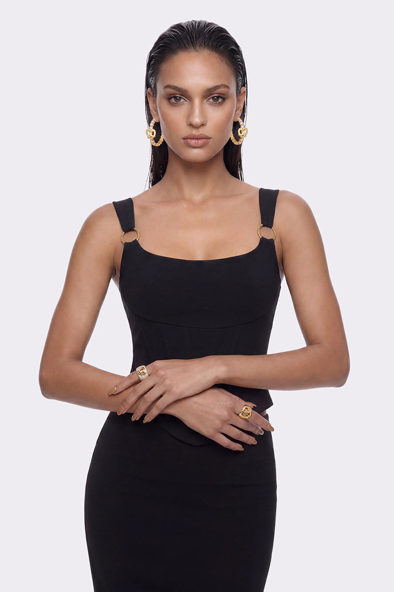 Black Roxana top by Nana Jacqueline, a stylish corset-style top with a fitted design and elegant detailing.