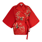 Nadya Shah Ruby Casiss Belted Jacket displayed on a mannequin, featuring a stylish belt and tailored design for modern fashion.