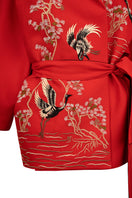 Nadya Shah Ruby Cassis belted jacket displayed on a mannequin, featuring a stylish design with a belt at the waist.