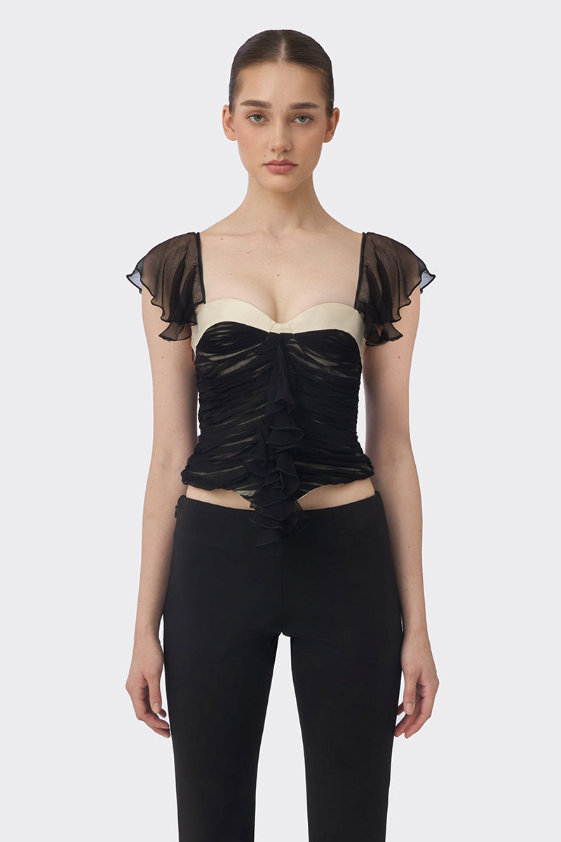 Black ruched mini top from Stolen Stores, featuring gathered fabric and a stylish, fitted design perfect for casual or night-out looks.