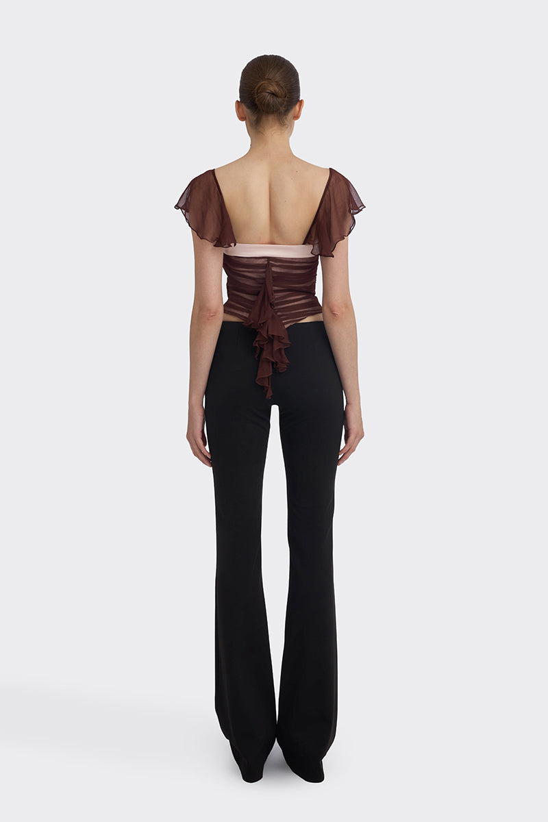 Brown ruched mini top by Stolen Stores, showing close-up of gathered fabric and sleeveless design, perfect for casual wear.