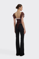 Brown ruched mini top from Stolen Stores, featuring a fitted design and stylish detailing, perfect for casual or trendy outfits.