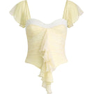 Yellow CULT MIA X Stolen Stores ruched mini top, showcasing fitted design with ruched detailing on a stylish women's top.