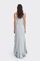 Dusty blue ruffle slit maxi dress by Stolen Stores, flowing fabric with elegant ruffle details and a high slit for a stylish look.