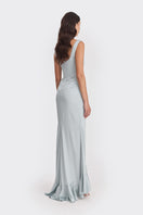 Dusty blue ruffle slit maxi dress by Stolen Stores featuring flowing fabric and elegant design for summer occasions.