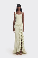 Light green Cult Mia X Stolen Stores ruffle split maxi dress displayed on a model, featuring a flowing silhouette and elegant design.