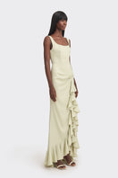 Light green CULT MIA X Stolen Stores ruffle split maxi dress displayed on a model, featuring a flowing silhouette and stylish ruffle details.