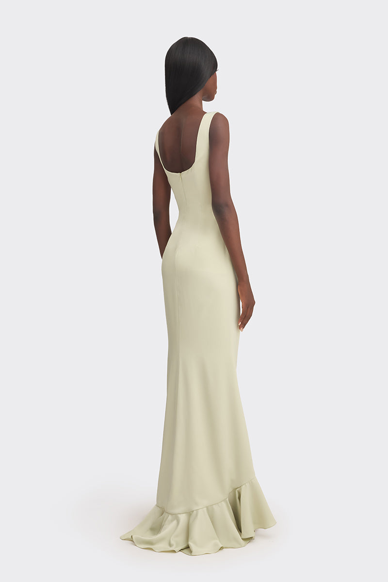 Light green CULT MIA X Stolen Stores ruffle split maxi dress displayed on a hanger against a neutral background.