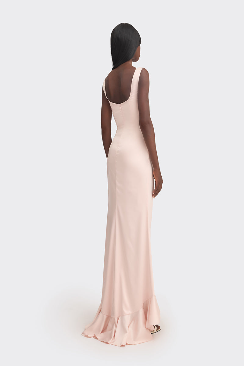 Light peach CULT MIA X Stolen Stores ruffle split maxi dress, elegant flowy design with ruffle and slit details.