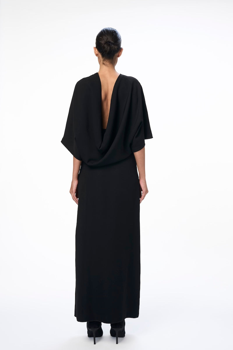 Black RUNA maxi dress by URA, flowing fabric and elegant design perfect for casual or dressy occasions.