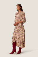 Rebecca Taylor RAE ruffle wrap midi skirt in a multi-colored floral pattern, flowing fabric with ruffled hem detail.