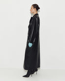 Black leather coat by Sayya, stylish and sleek, featuring a classic design with detailed stitching and a front button closure.