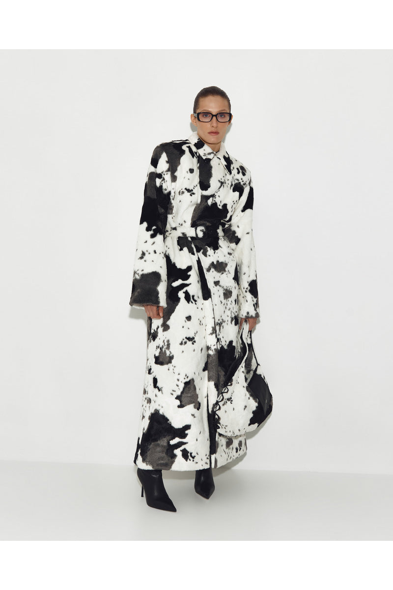 Sayya FUR MAXI COAT IN COW, a stylish long coat made from cow fur, showcasing a plush, luxurious texture and elegant design.