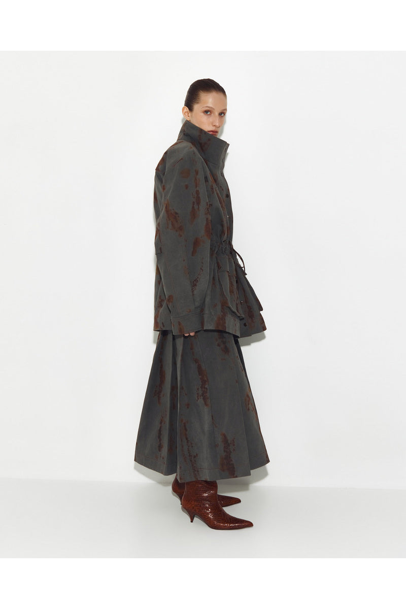 Gray denim jacket by Sayya with classic design, featuring button closure and chest pockets, displayed on a hanger.