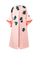 Pink Inner Blossom coat from Tiny Ink featuring a soft, lightweight design and subtle floral accents.