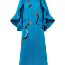 Blue Poppy of the Moon coat by Tiny Ink, stylish and cozy outerwear with floral-inspired design, shown on a model.
