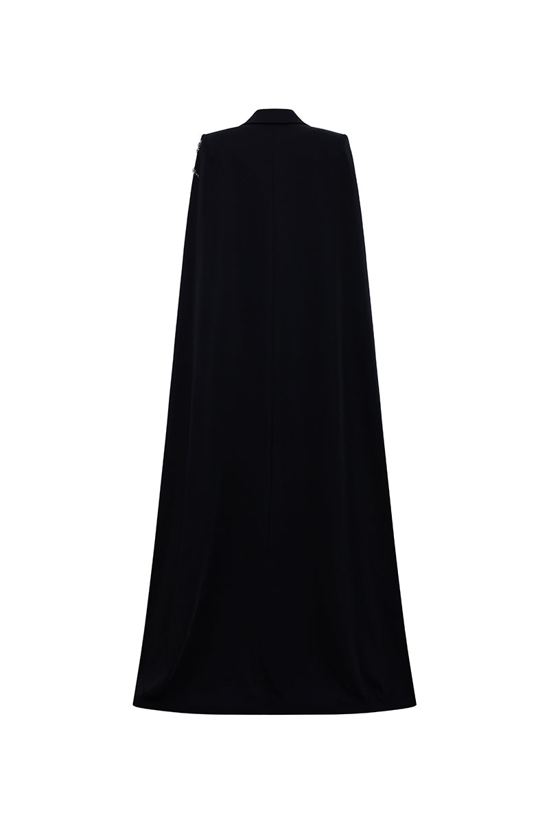 Black embroidered high neck gown by GVLUX featuring intricate embroidery and a flowing design, perfect for formal occasions.