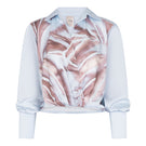 Baby blue Tinta Latina Sabana blouse, a stylish women’s top with a relaxed fit and soft fabric, perfect for casual wear.