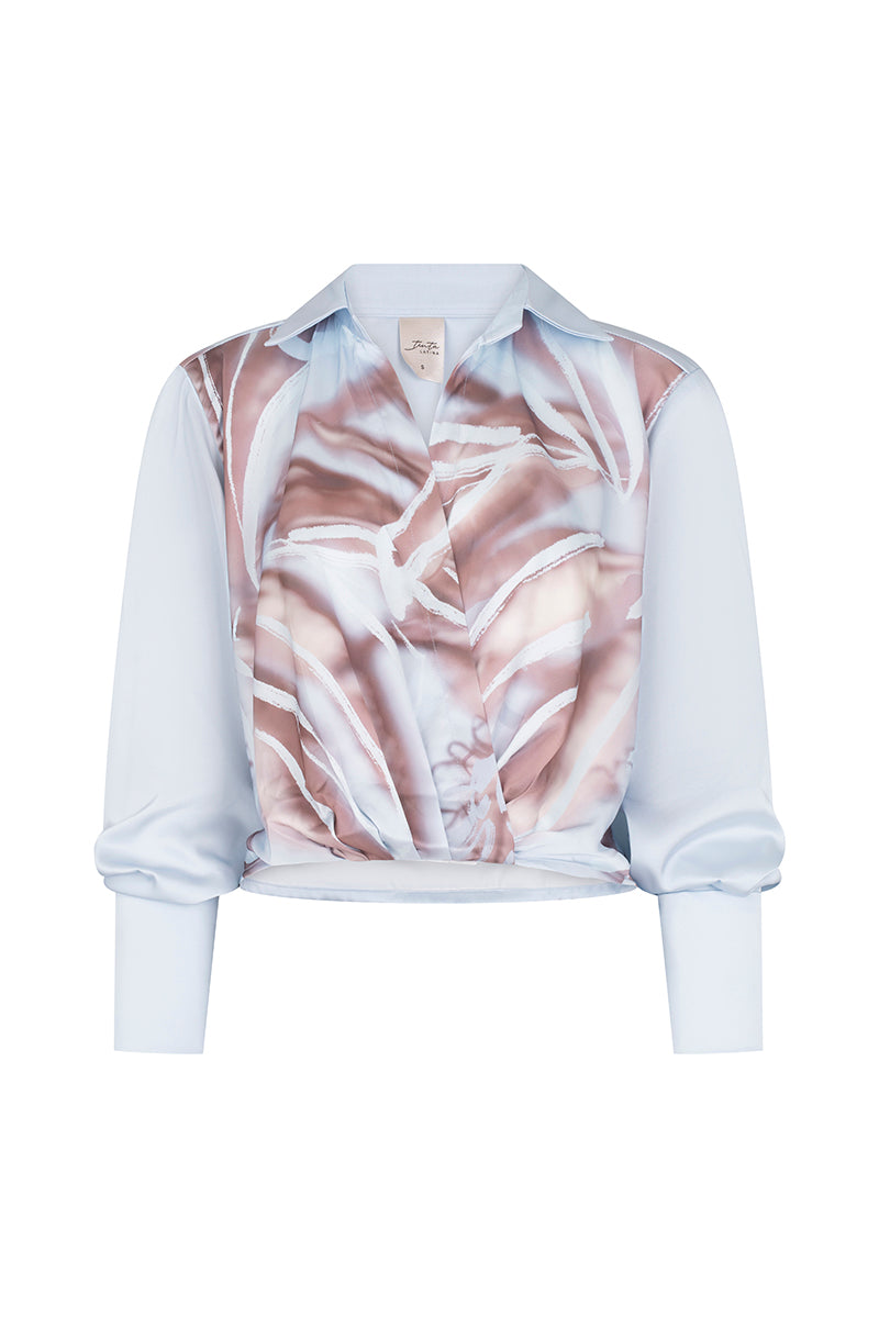 Baby blue Tinta Latina Sabana blouse, a stylish women’s top with a relaxed fit and soft fabric, perfect for casual wear.