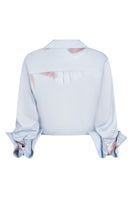 Tinta Latina Sabana blouse in baby blue, stylish top with a relaxed fit, featuring soft fabric and elegant design.