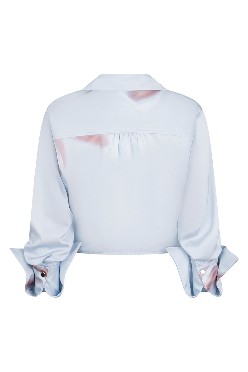 Tinta Latina Sabana blouse in baby blue, stylish top with a relaxed fit, featuring soft fabric and elegant design.