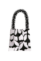 Black and white Clash of Prints shoulder bag by SAC DE SOUL, stylish accessory with bold graphic design.
