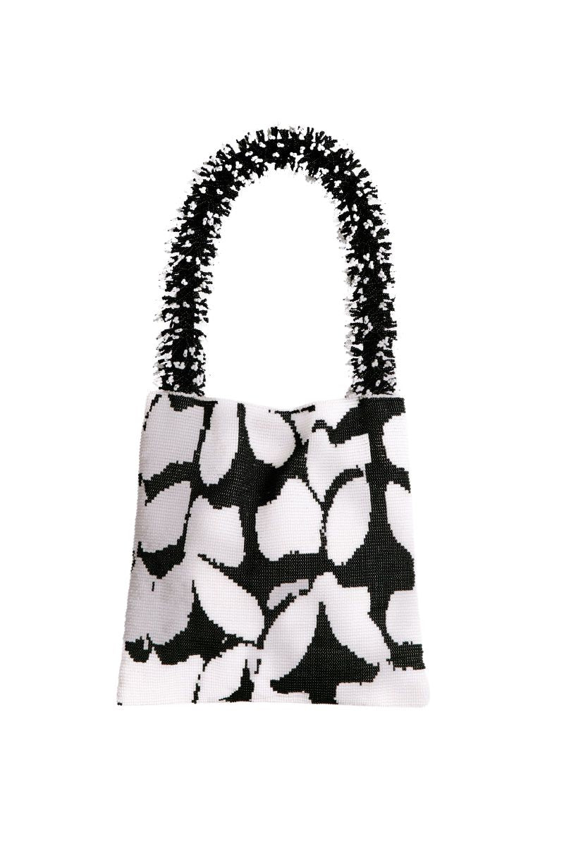 Black and white Clash of Prints shoulder bag by SAC DE SOUL, stylish accessory with bold graphic design.
