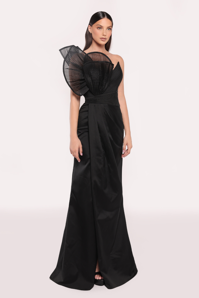 Black Sage gown by Tarık Ediz featuring elegant flowing fabric and detailed design, perfect for formal occasions.