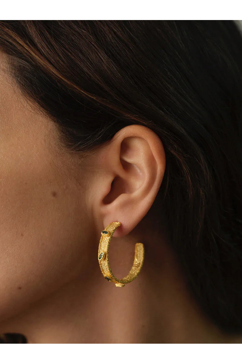 Peracas Salma hoops earrings in vibrant green with a stylish, rounded design perfect for adding a pop of color to your look.