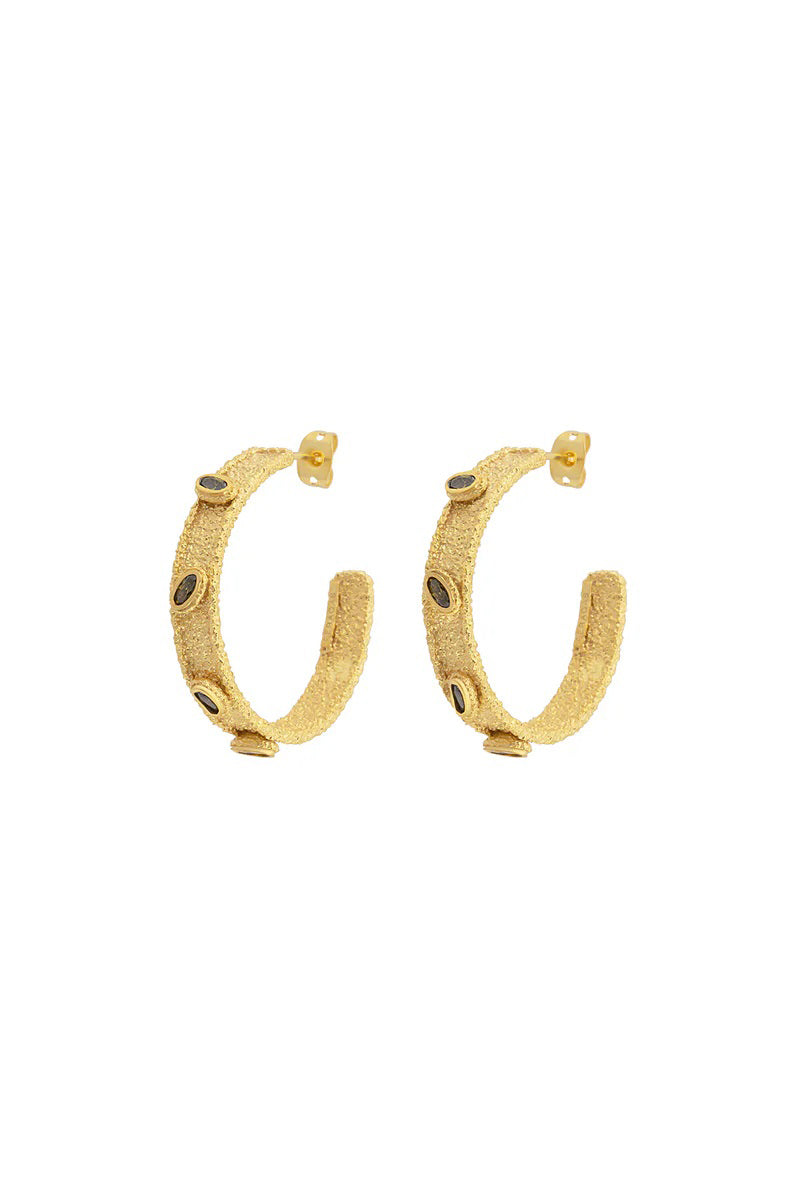 Peracas Salma Hoops in green earrings with a stylish, circular design, perfect for adding a touch of elegance to any outfit.
