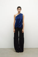 Satin asymmetric top by JC Pajares featuring a stylish, flowing design in soft satin fabric with unique asymmetric hem.