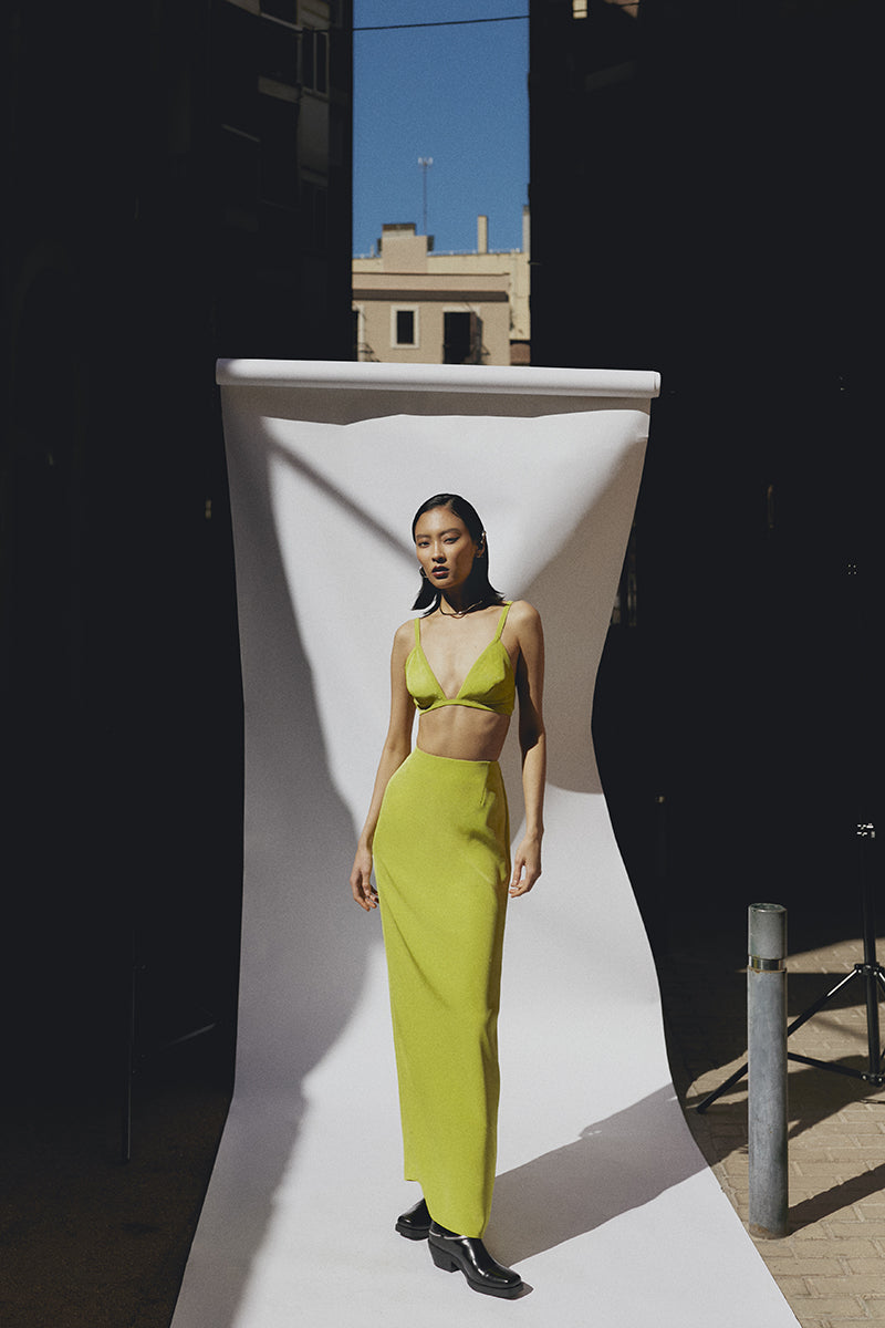 Sayya lime maxi skirt with flowy fabric and elastic waistband, full length with a vibrant, stylish design.