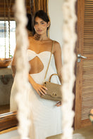 Mara Brazil Serena Bag Lurex top handle bag with metallic gold finish, stylish and elegant for versatile occasions.