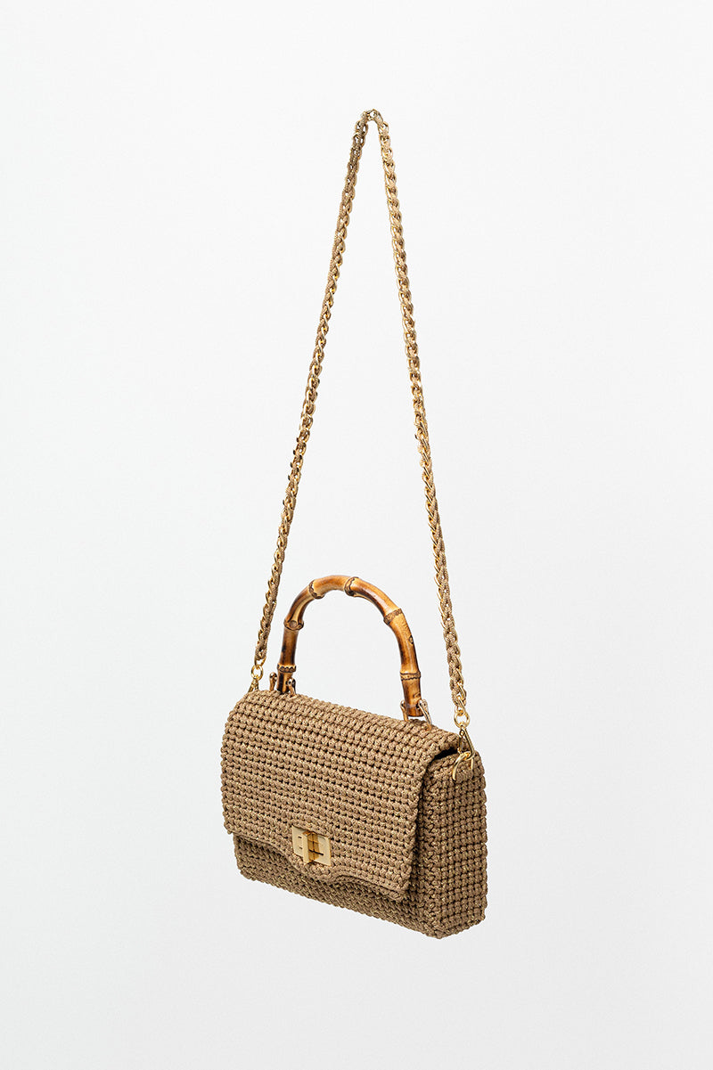 Mara Brazil Serena Bag Lurex top handle bag with metallic gold finish and structured design, featuring a slim top handle and elegant style.