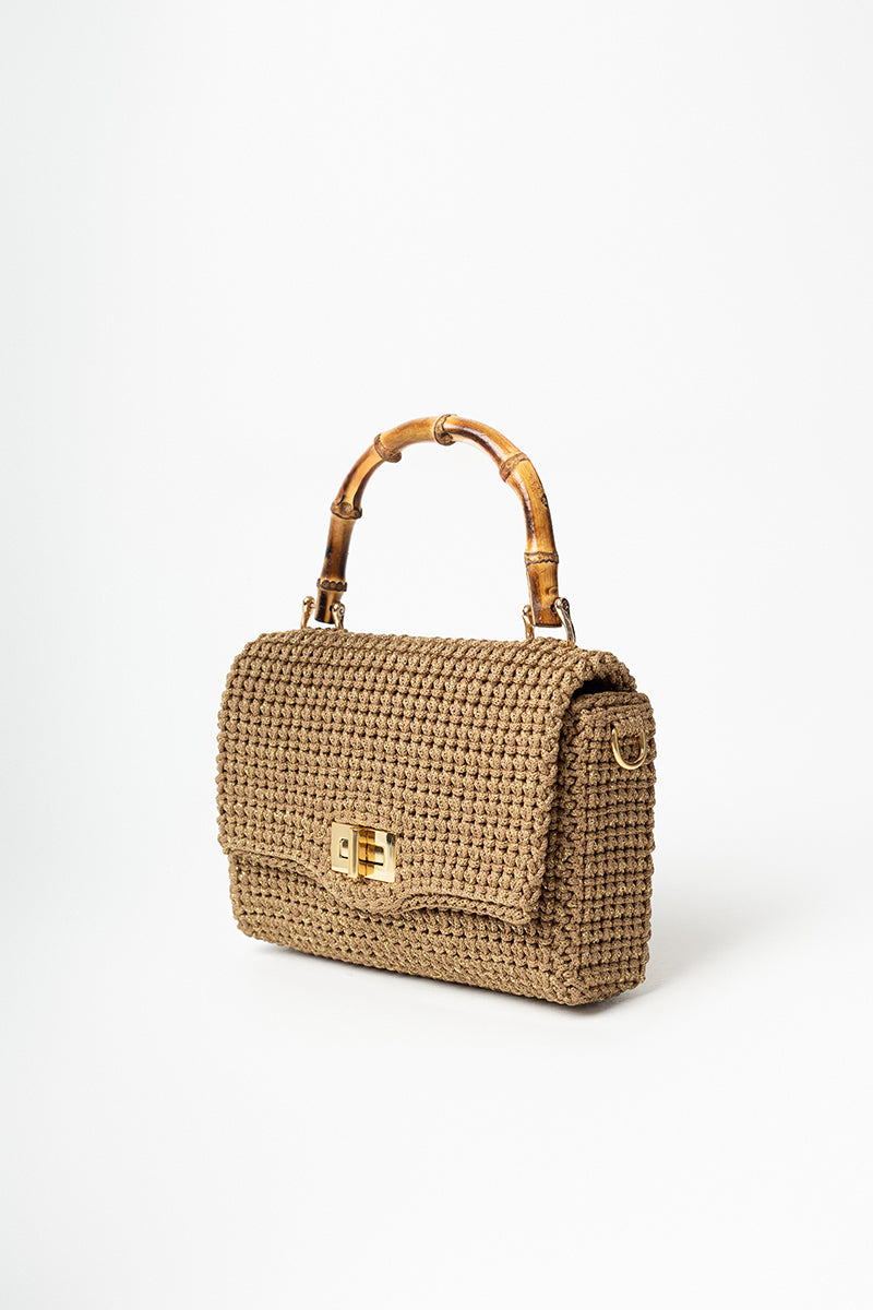 Mara Brazil Serena Bag Lurex top handle bag with metallic gold fabric and structured design, featuring a sleek top handle.