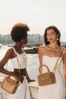 Mara Brazil MURIA top handle bag with sleek design and textured leather in a stylish, versatile accessory.