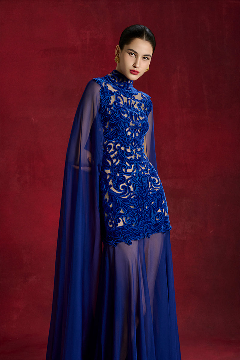 Le Thanh Hoa Lattice Heritage Gown featuring intricate lattice design and elegant fabric for formal occasions.